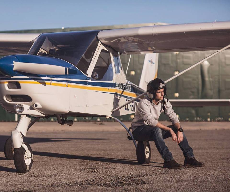 Me sitting on the left rear wheel of the Tecnam-P92 I used to fly
