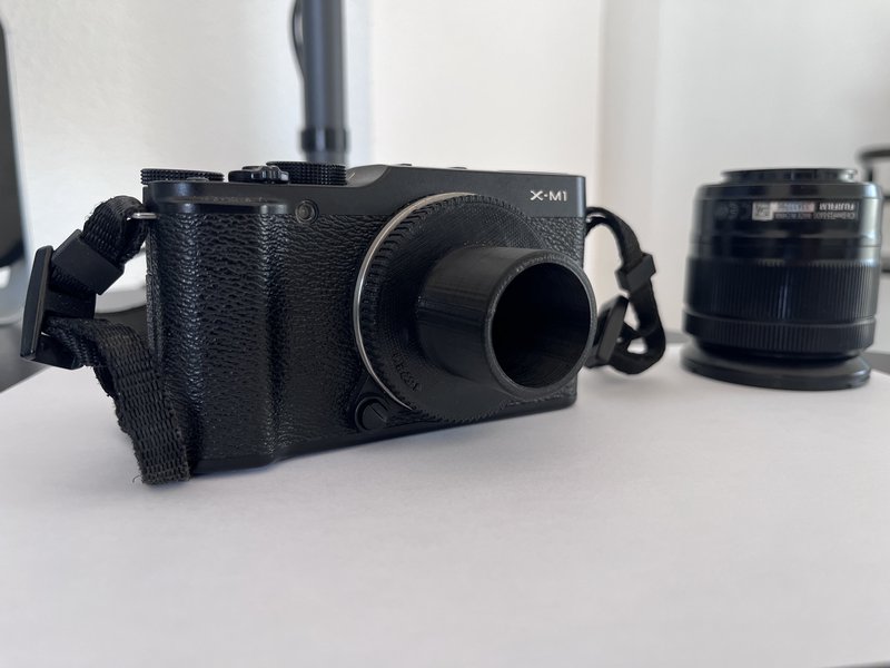 Fujifilm X-M1 with the 1.25-inch adapter attached.