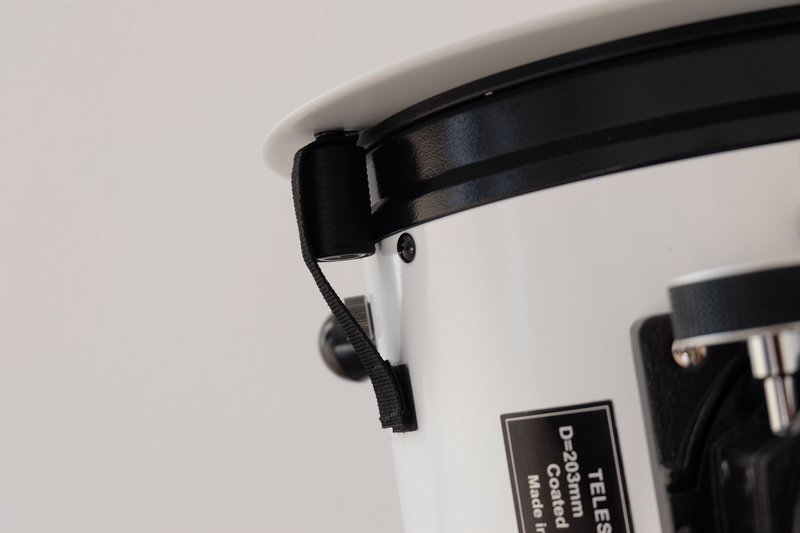 Velcro strap used as a secondary attachment between the filter and the tube.